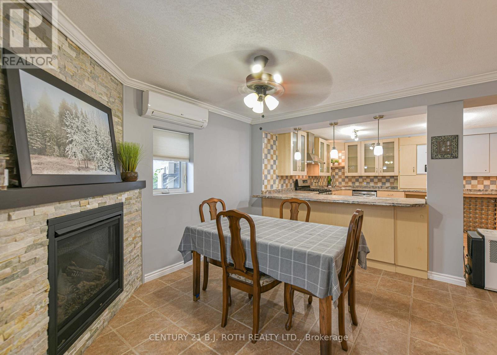 16 First Street, Orillia, ON - Indoor Photo Showing Dining Room With Fireplace