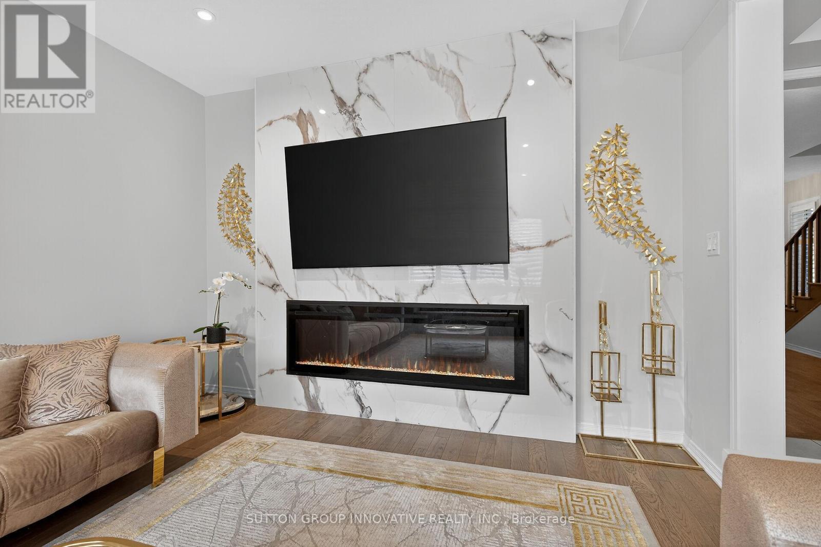 18 Lise Lane, Haldimand, ON - Indoor Photo Showing Living Room With Fireplace