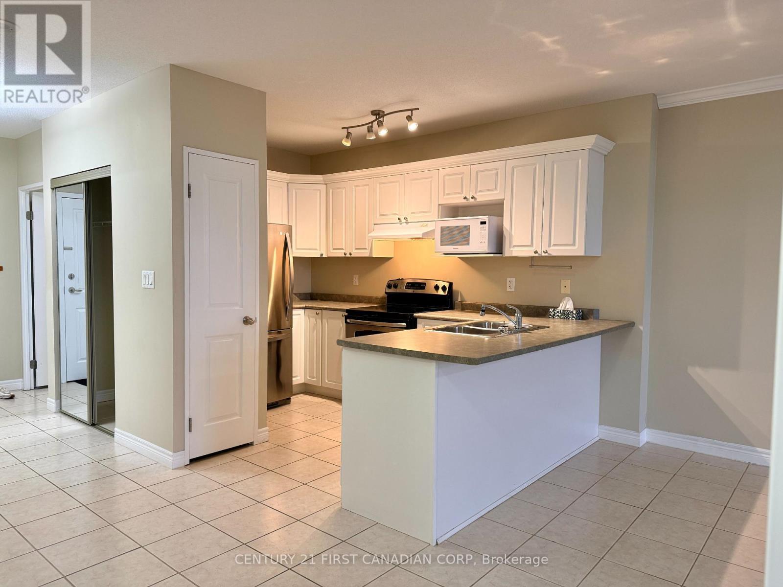 1109 - 353 Commissioners Road W, London South (South D), ON - Indoor Photo Showing Kitchen With Double Sink