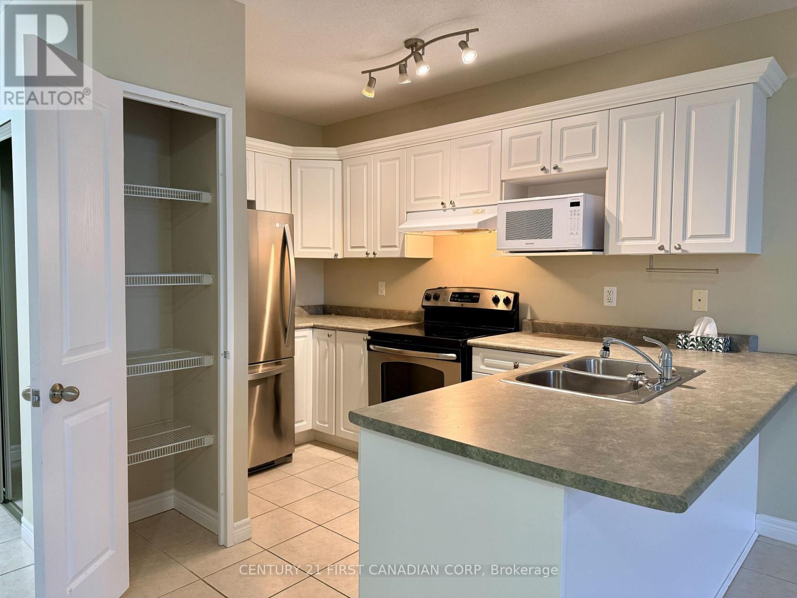 1109 - 353 Commissioners Road W, London South (South D), ON - Indoor Photo Showing Kitchen With Double Sink
