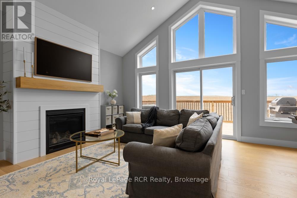 13 Jonathan Crescent, South Bruce, ON - Indoor Photo Showing Living Room With Fireplace