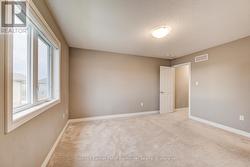 another view of primary bedroom -