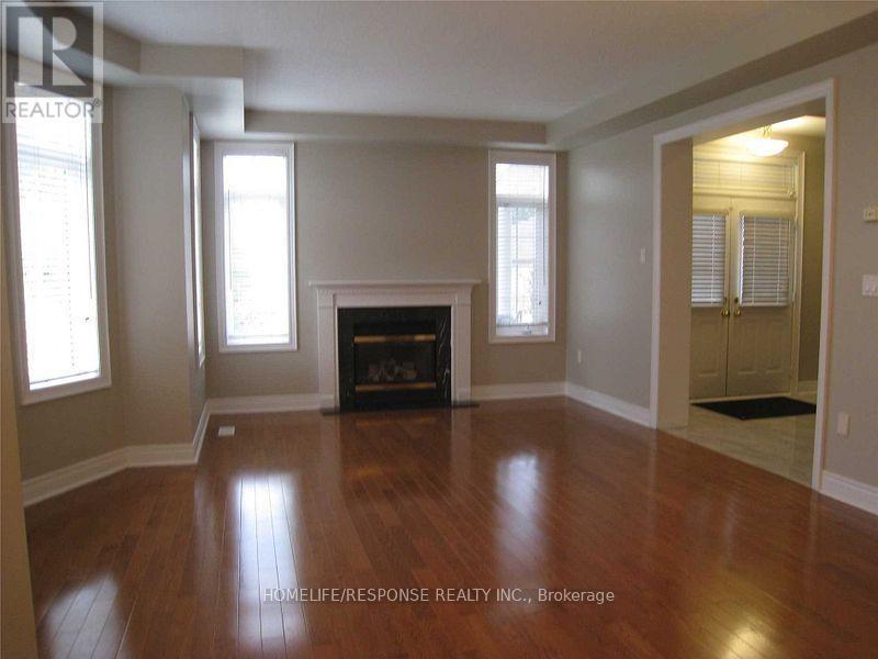 Upper Level - 2 Mcnutt Street, Brampton, ON - Indoor Photo Showing Living Room With Fireplace