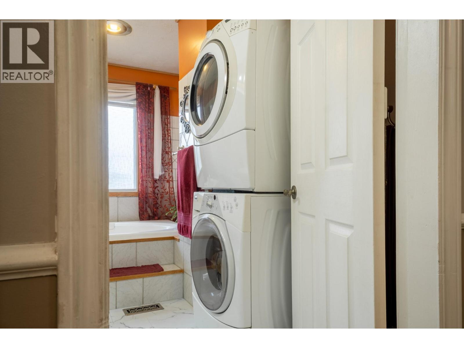 Main Bathroom and Laundry Room - 1801 Mission Road, Vernon, BC - Indoor Photo Showing Laundry Room