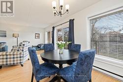 Updated trim & flooring, lighting, blinds -