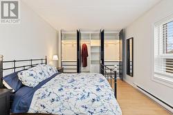 Spacious primary, Custom closets w auto lighting -