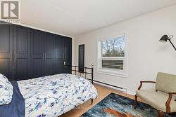 Wall-to-wall custom closets with lighting -