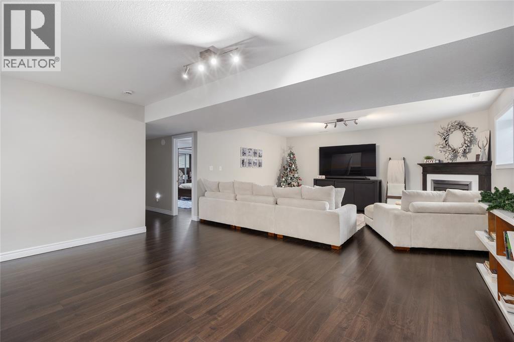 279 Homestretch Drive, St Clair, ON - Indoor Photo Showing Living Room With Fireplace