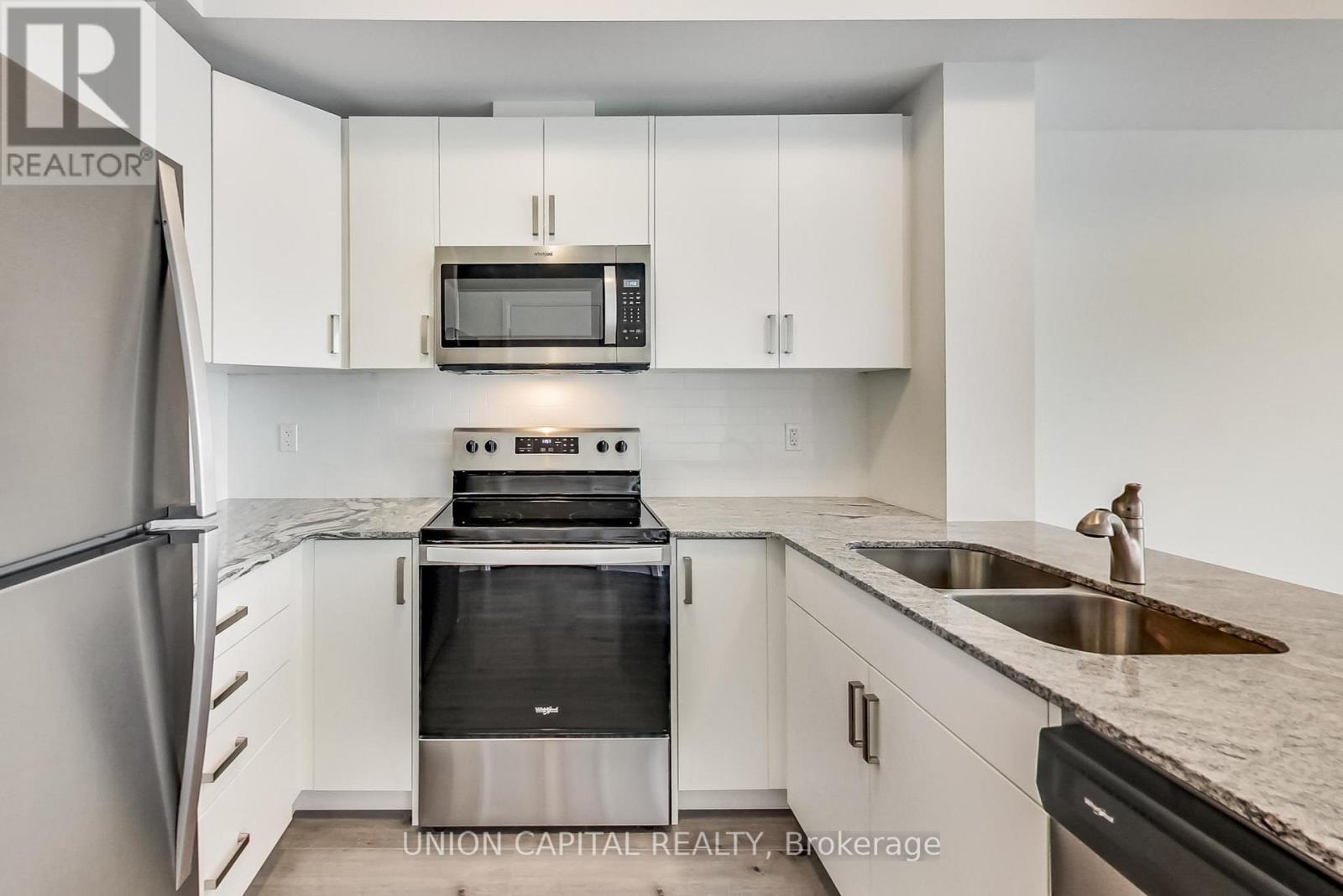 801 - 60 Charles Street W, Kitchener, ON - Indoor Photo Showing Kitchen With Double Sink With Upgraded Kitchen