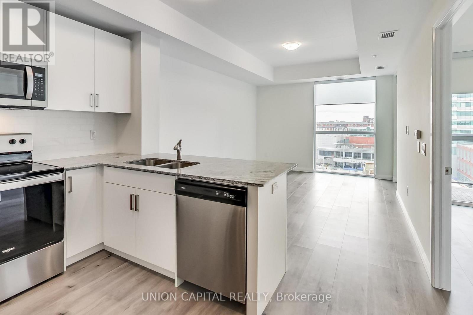 801 - 60 Charles Street W, Kitchener, ON - Indoor Photo Showing Kitchen With Double Sink