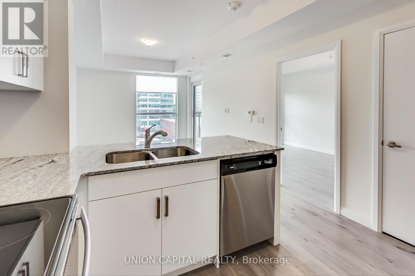 801 - 60 Charles Street W, Kitchener, ON - Indoor Photo Showing Kitchen With Double Sink