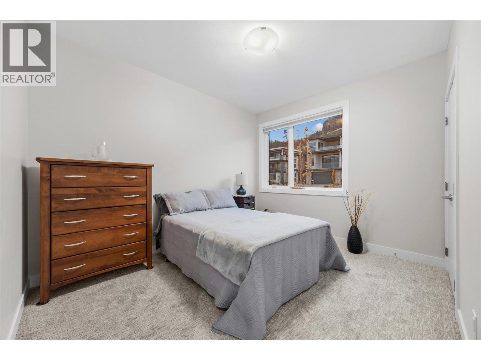 Upstairs Bedroom 3 - 9438 Ledgestone Road, Lake Country, BC - Indoor Photo Showing Bedroom
