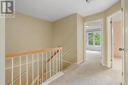 Bright & cheery landing at top of stairs. -