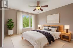 Virtually staged Primary Bedroom. -