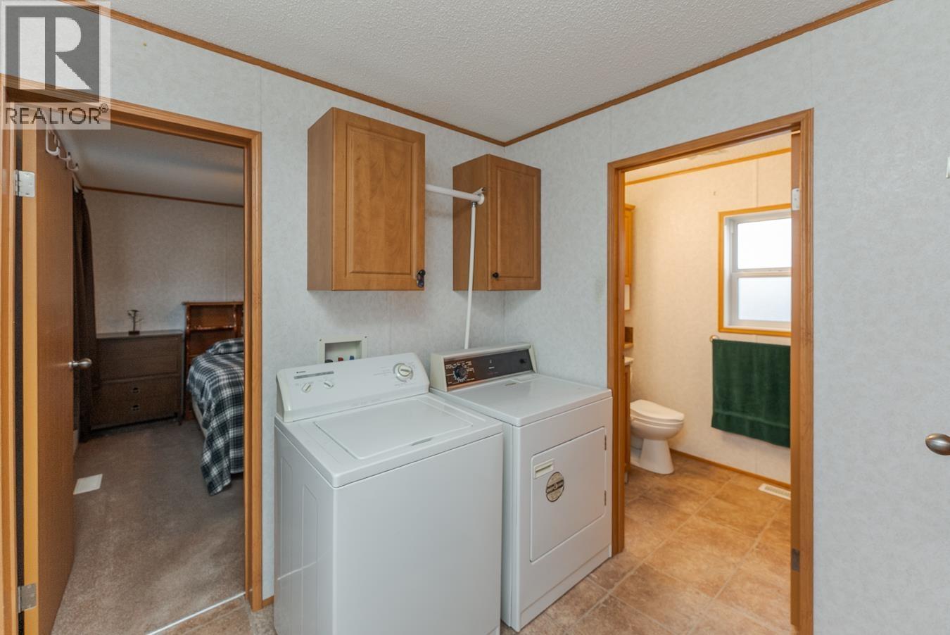 32 7817 S 97 Highway, Prince George, BC - Indoor Photo Showing Laundry Room