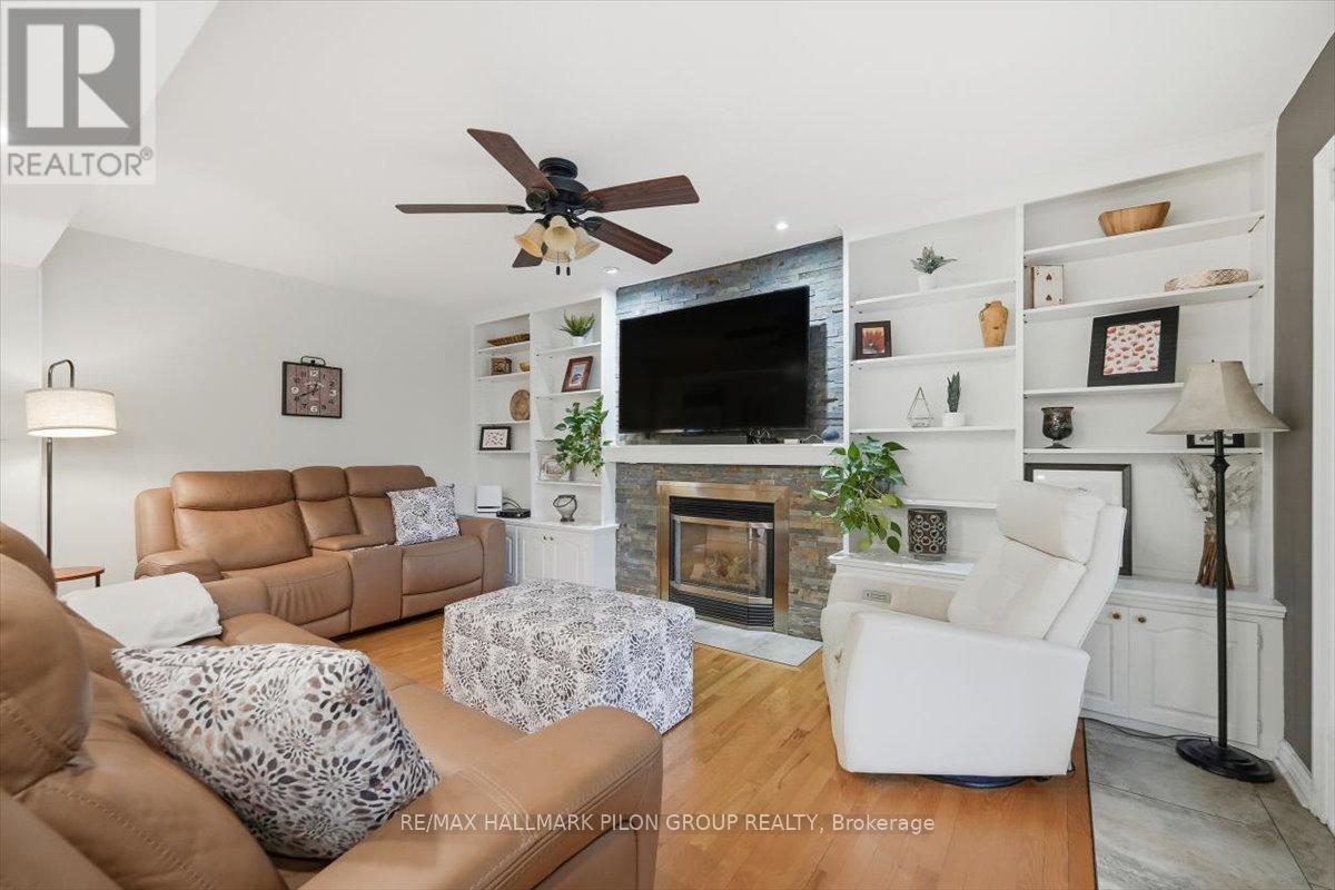 6464 Beausejour Drive, Ottawa, ON - Indoor Photo Showing Living Room With Fireplace