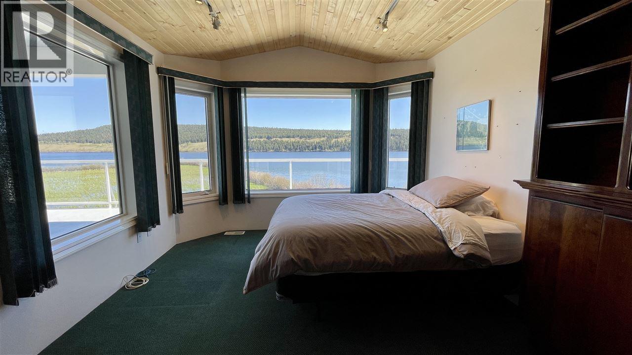 6262 Mulligan Drive, Horse Lake, BC - Indoor Photo Showing Bedroom