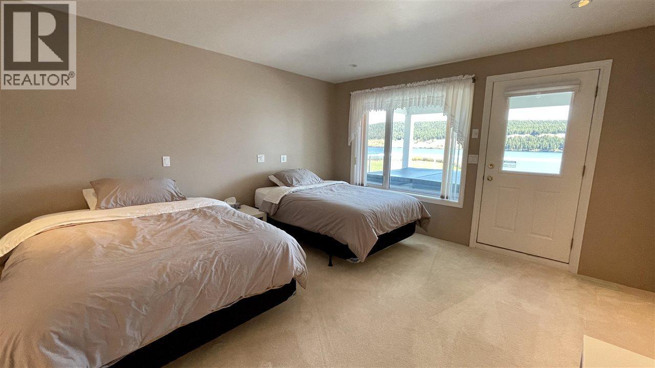 6262 Mulligan Drive, Horse Lake, BC - Indoor Photo Showing Bedroom