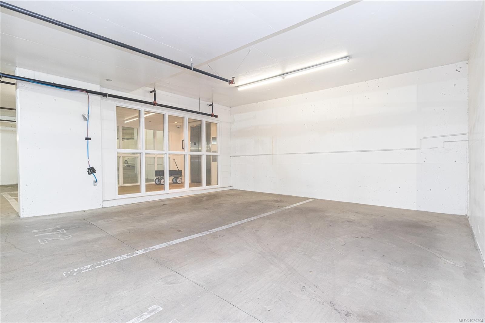 105-100 Saghalie Rd, Victoria, BC - Indoor Photo Showing Garage