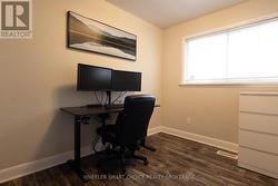 mainfloor bedroom used as a home office currently -