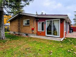 back of the house and the sunroom. -