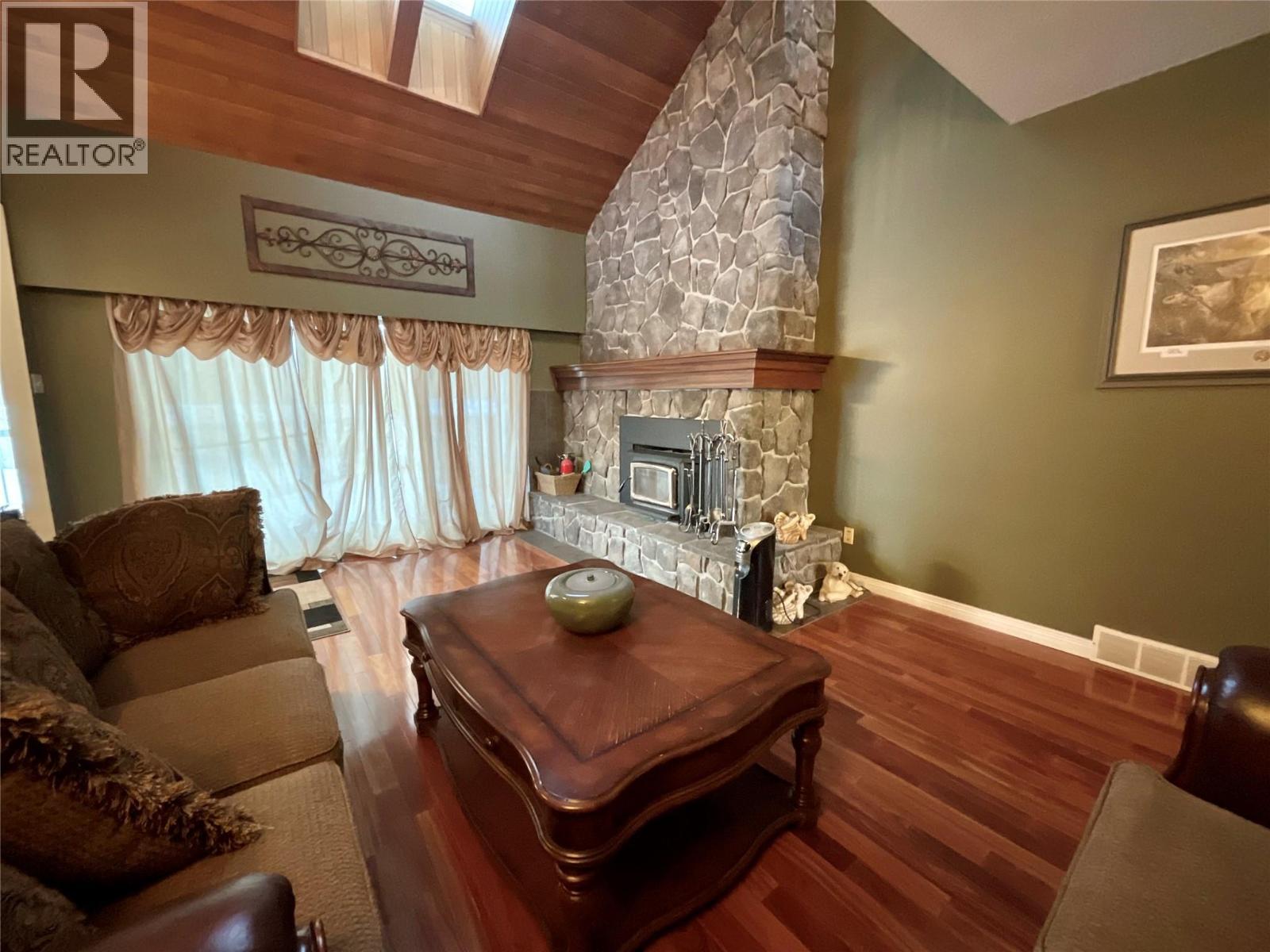 12 Collier Place, Tumbler Ridge, BC - Indoor Photo Showing Other Room With Fireplace