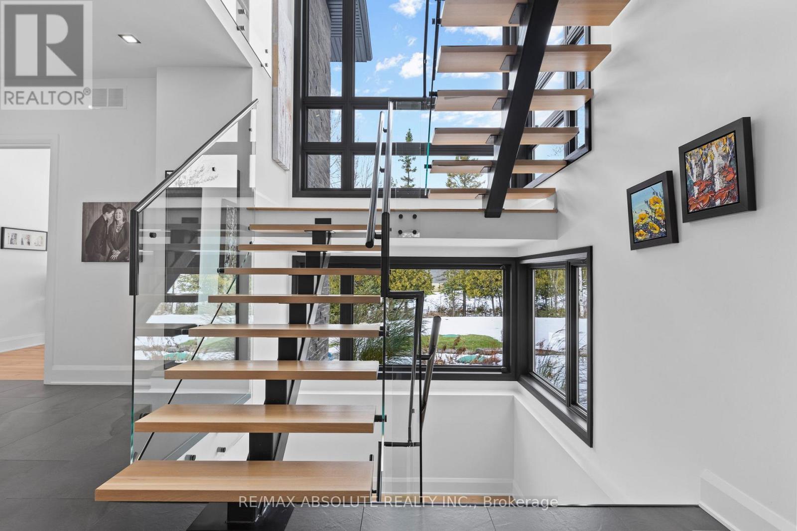 Open gorgeous staircase! - 131 Cherryhill Drive, Ottawa, ON - Indoor Photo Showing Other Room