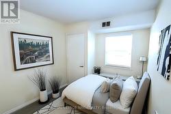 Virtually staged second bedroom -