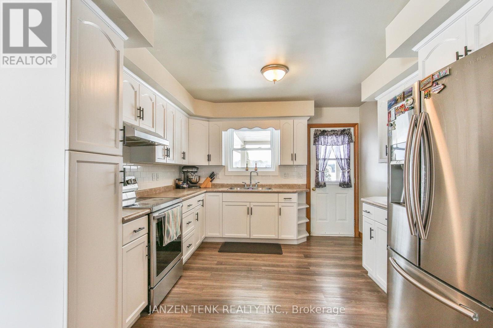 1728 1St Concession Road, Norfolk, ON - Indoor Photo Showing Kitchen With Double Sink