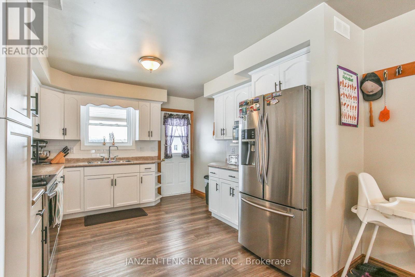1728 1St Concession Road, Norfolk, ON - Indoor Photo Showing Kitchen With Double Sink