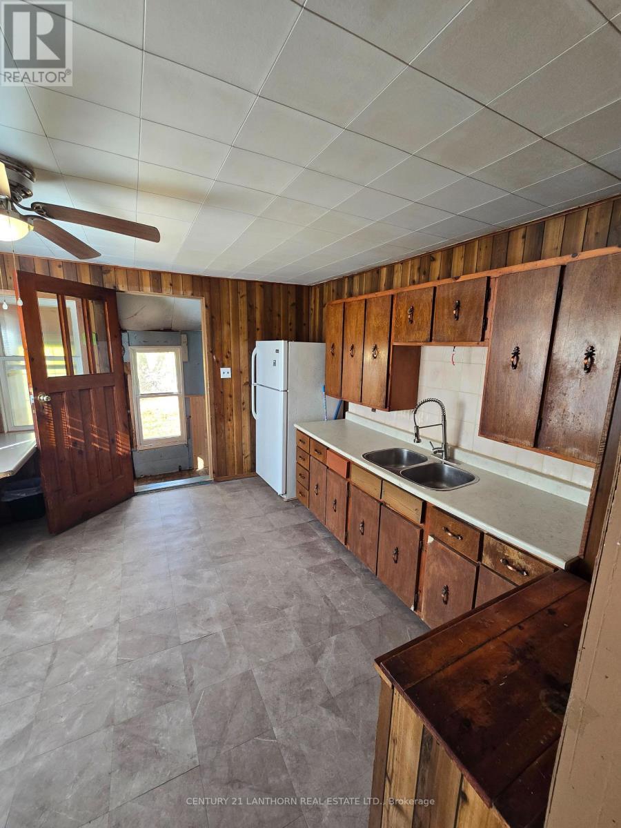 2436 Henderson Road, Frontenac (Frontenac Centre), ON - Indoor Photo Showing Kitchen With Double Sink