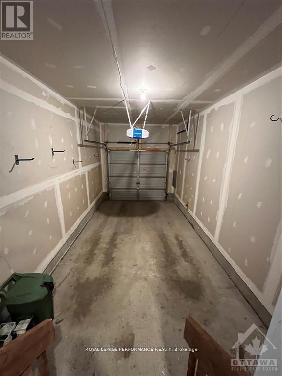 18 Gardenpost Terrace S, Ottawa, ON - Indoor Photo Showing Garage