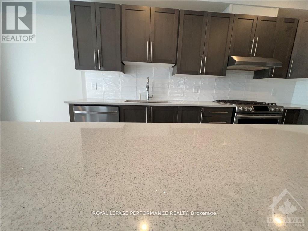 18 Gardenpost Terrace S, Ottawa, ON - Indoor Photo Showing Kitchen With Double Sink