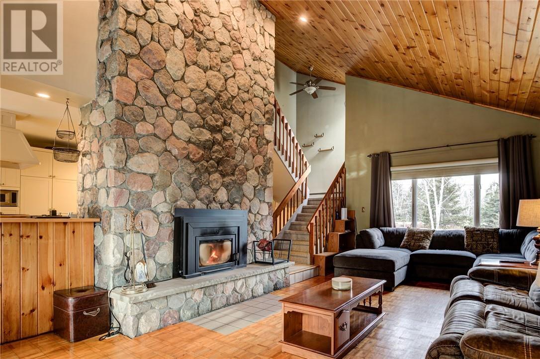 1767 Wallace Road, Chelmsford, ON - Indoor Photo Showing Living Room With Fireplace