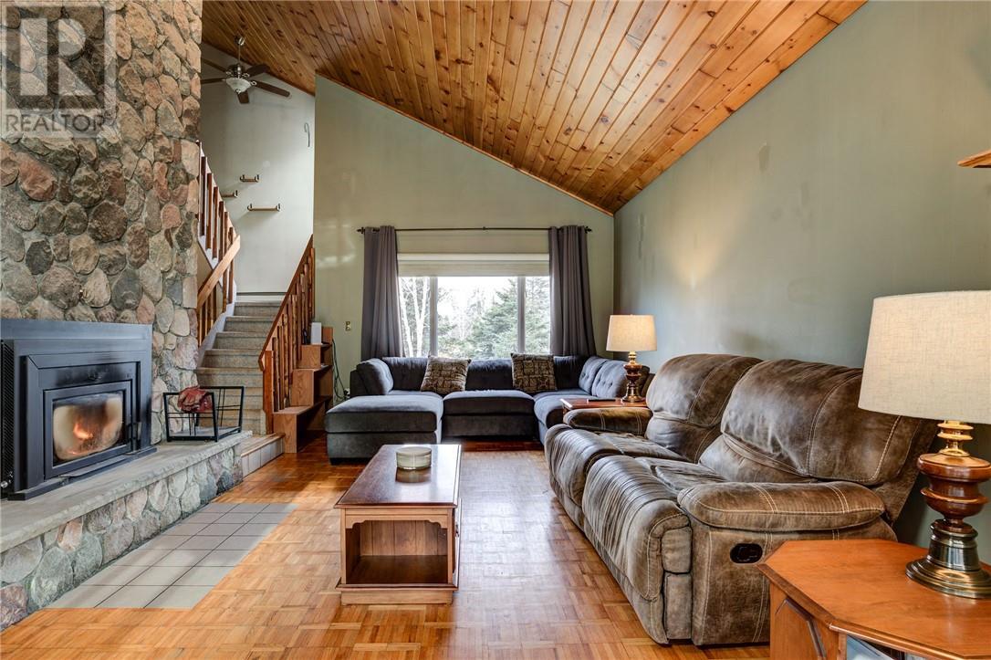 1767 Wallace Road, Chelmsford, ON - Indoor Photo Showing Living Room With Fireplace