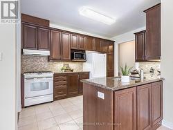 Granite countertops throughout kitchen -