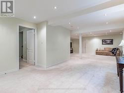 Finished basement with pot lights throughout -