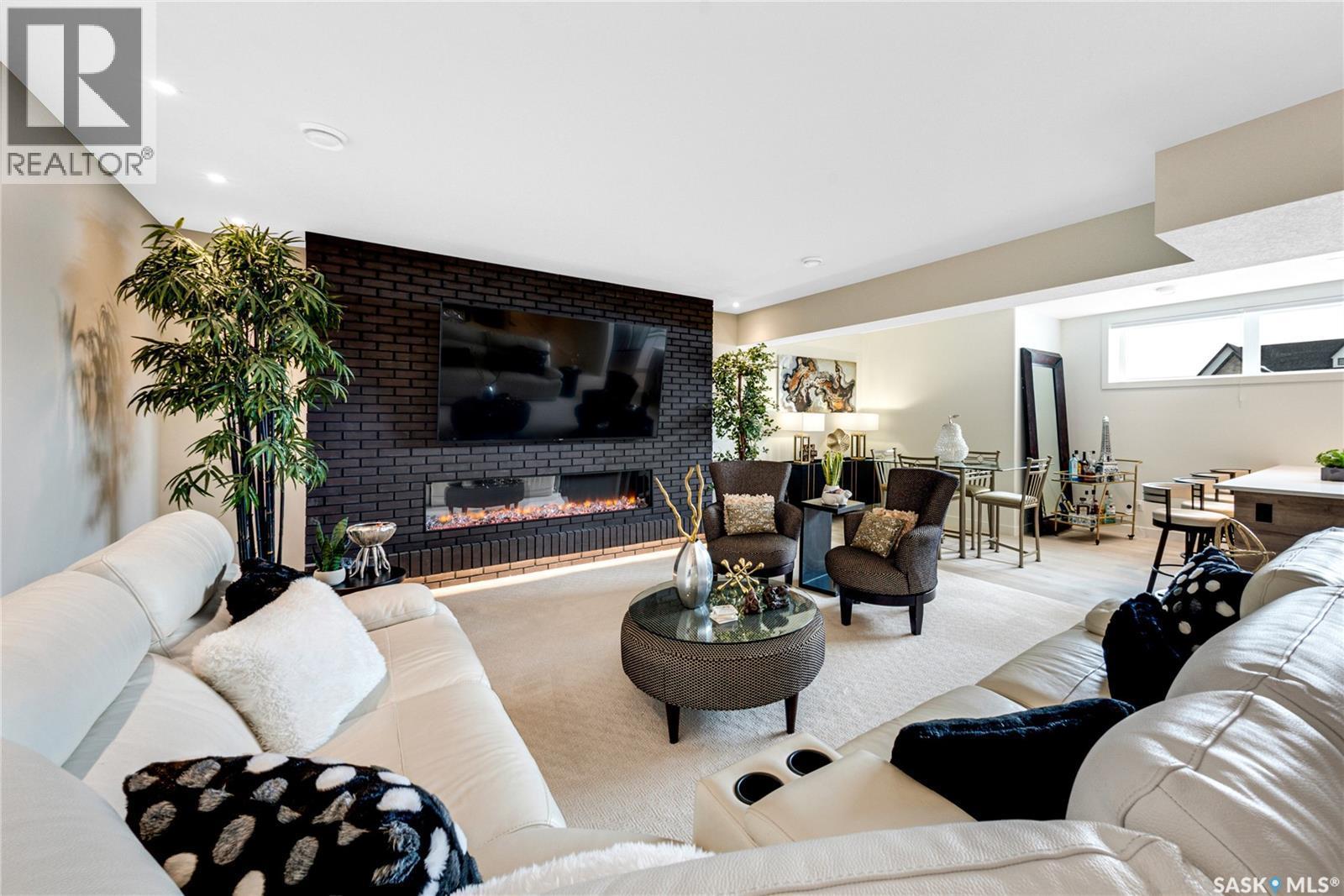 225 Edgemont Crescent, Corman Park Rm No. 344, SK - Indoor Photo Showing Living Room With Fireplace