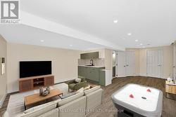 *Virtually staged basement rec room -