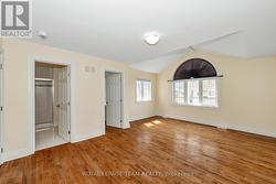 Primary bedroom with vaulted ceilings -