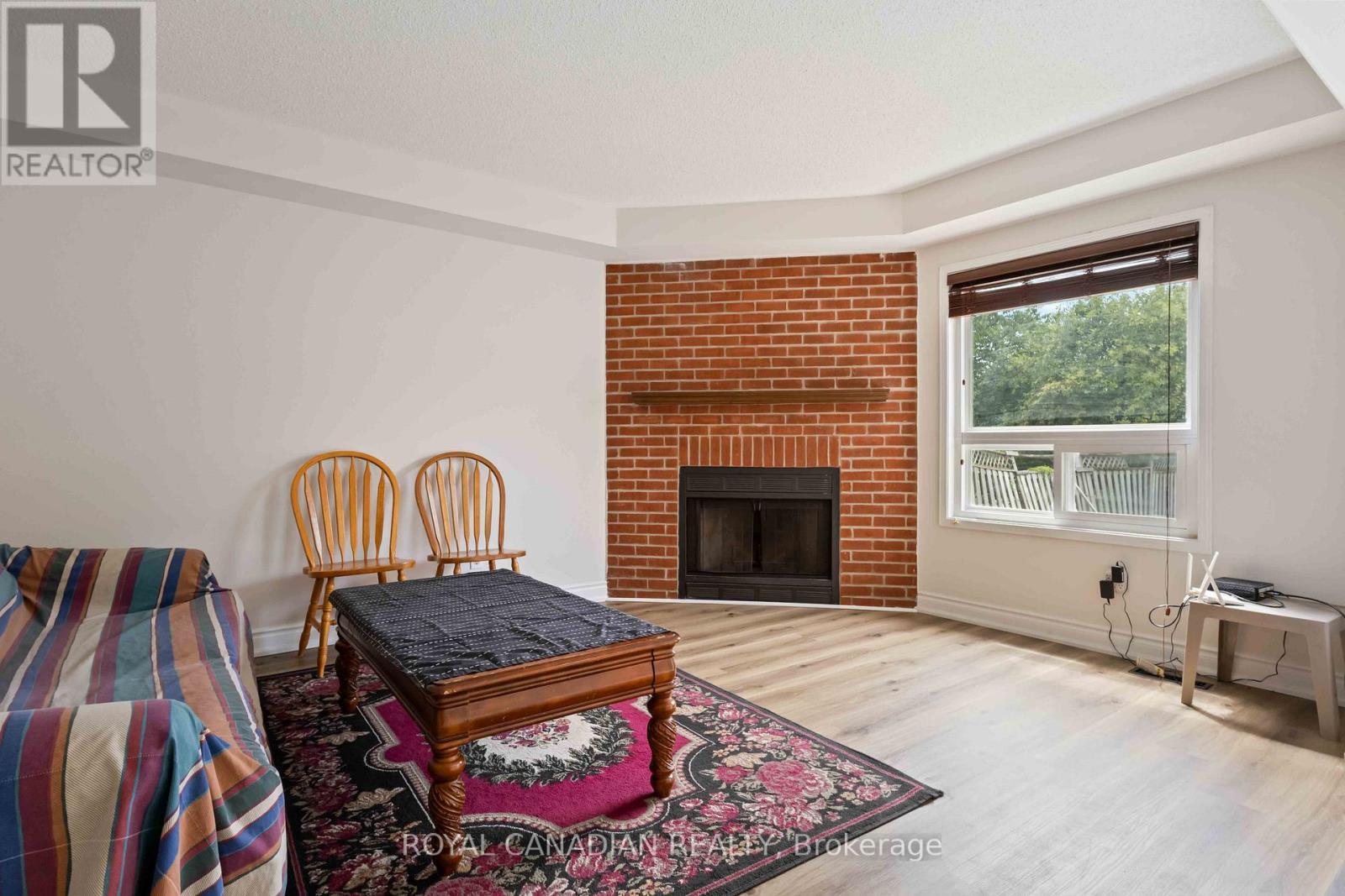 Upper - 107 Joycedale Street, Markham, ON - Indoor Photo Showing Living Room With Fireplace