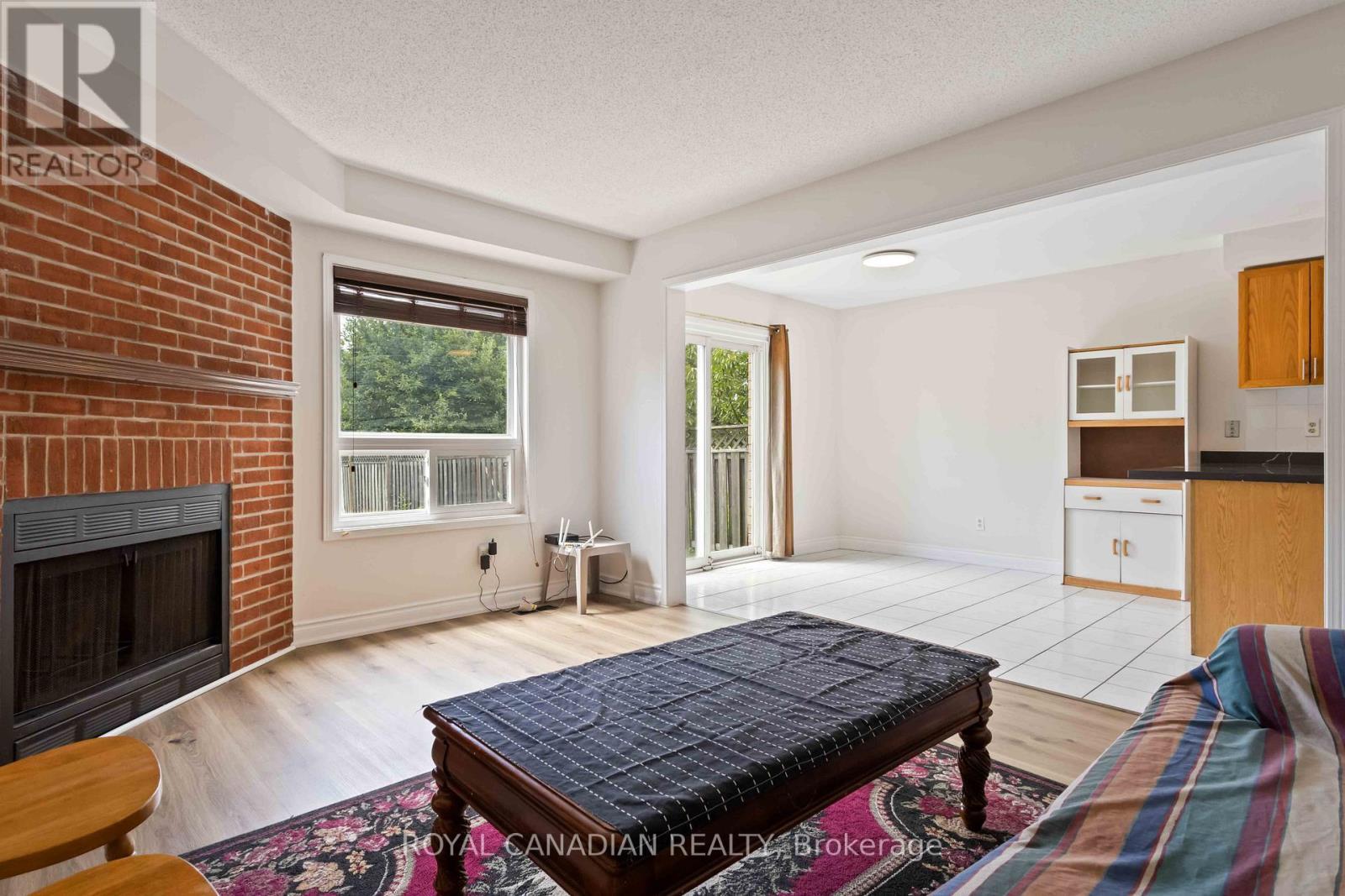 Upper - 107 Joycedale Street, Markham, ON - Indoor Photo Showing Living Room With Fireplace