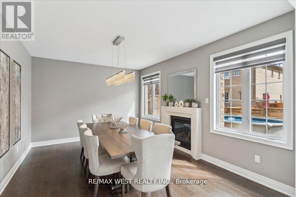 39 Condor Way, Vaughan, ON - Indoor Photo Showing Dining Room With Fireplace