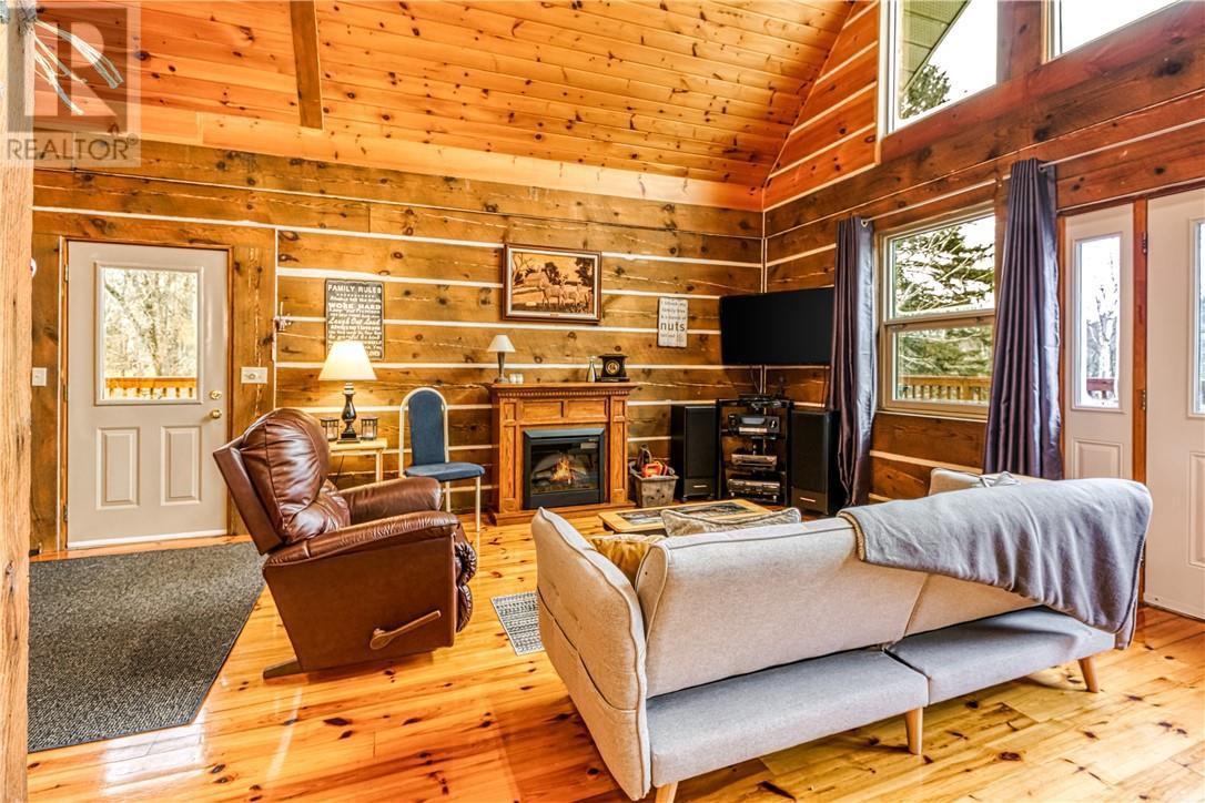 55 Brouse Road, Massey, ON - Indoor Photo Showing Living Room With Fireplace