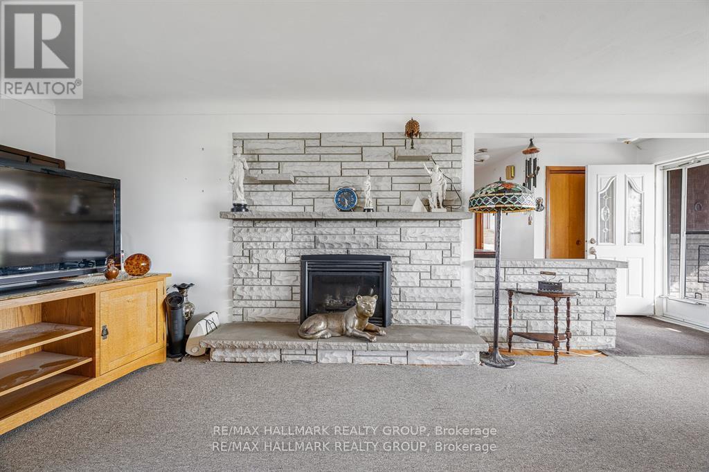 6050 Old Richmond Road, Ottawa, ON - Indoor Photo Showing Living Room With Fireplace