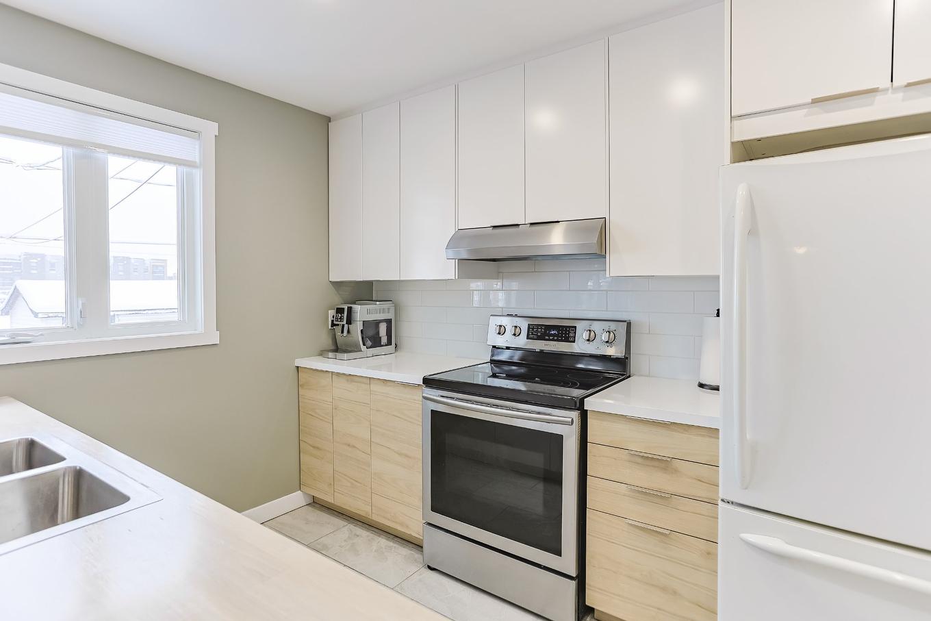 Cuisine - 5305 Rue De Prince-Rupert, Laval (Auteuil), QC - Indoor Photo Showing Kitchen With Double Sink
