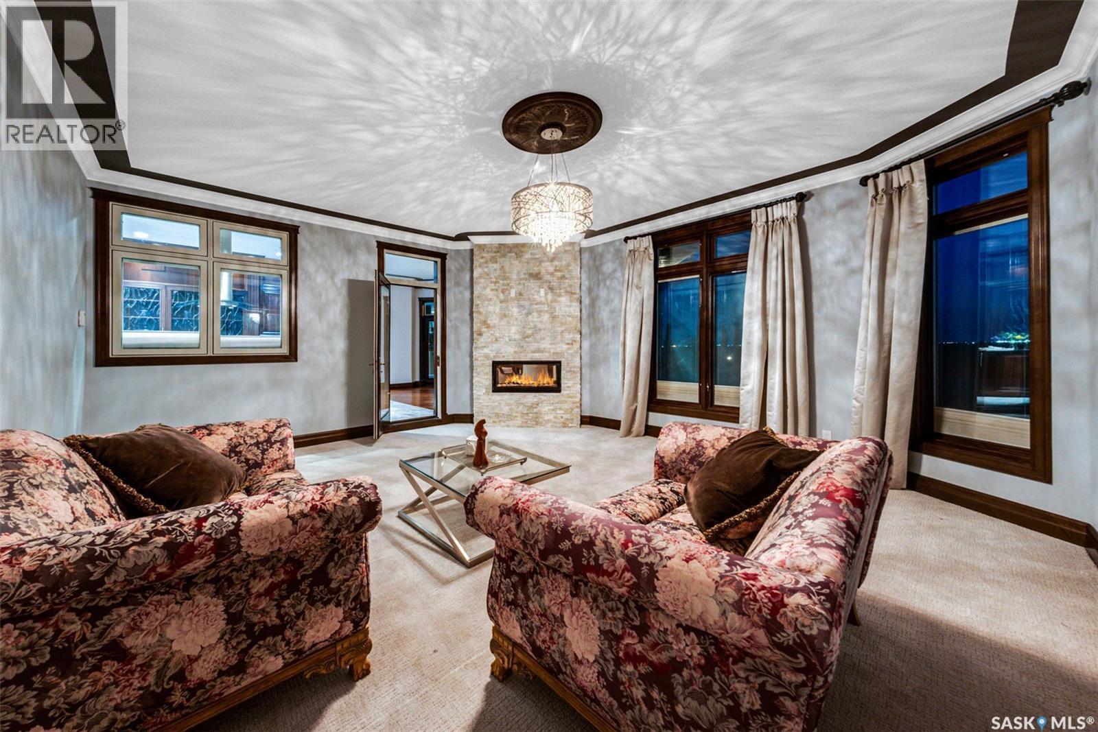 72 Rivers Edge Lane, Corman Park Rm No. 344, SK - Indoor Photo Showing Living Room With Fireplace