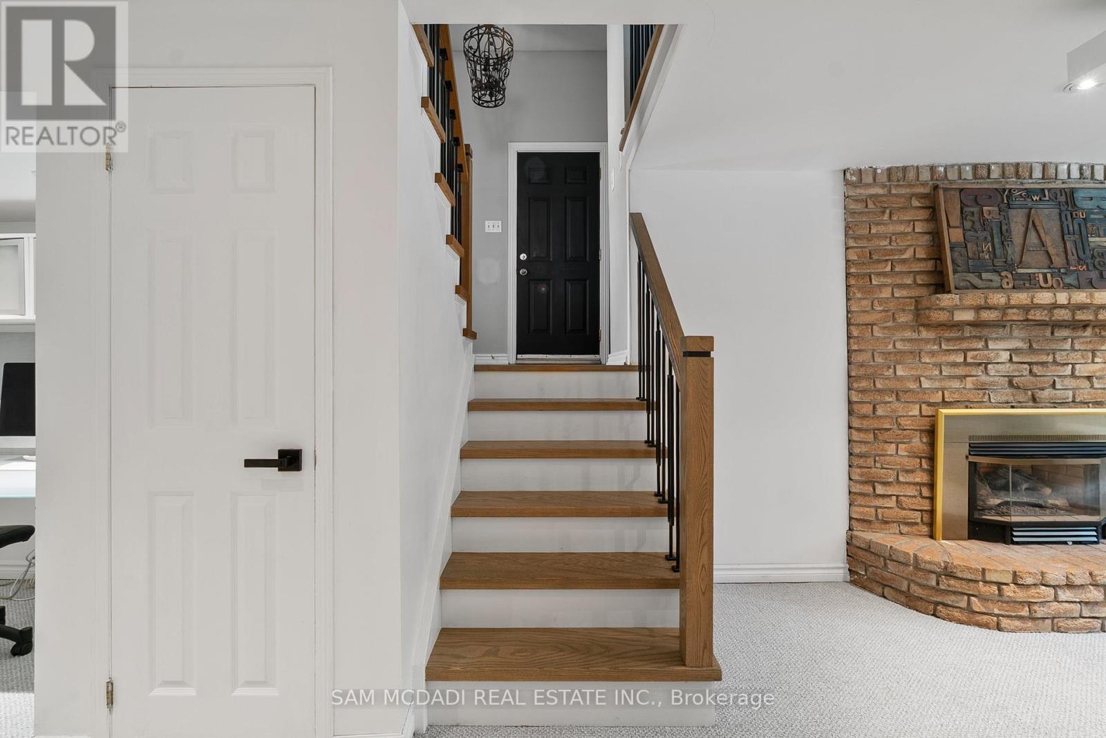 496 Seymour Drive, Oakville, ON - Indoor Photo Showing Other Room With Fireplace