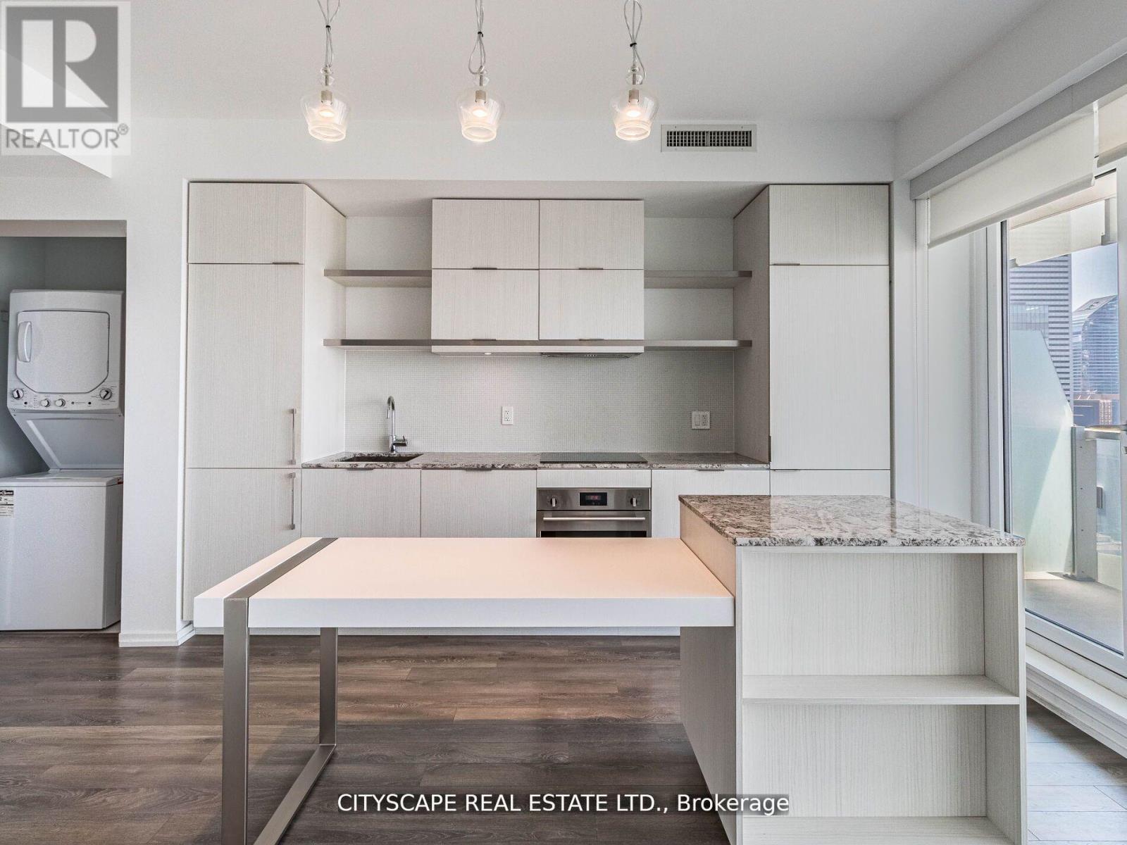 3111 - 197 Yonge Street, Toronto, ON - Indoor Photo Showing Laundry Room