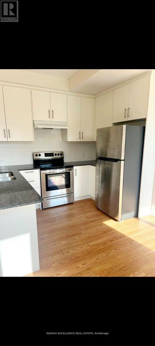 41 - 45 Knotsberry Circle, Brampton, ON - Indoor Photo Showing Kitchen With Double Sink
